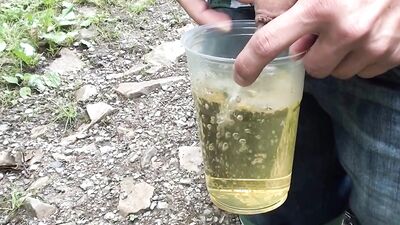 Twink Pissing In A Cup