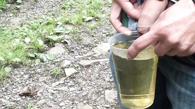 Twink Pissing In A Cup