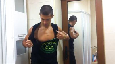 Muscle God Rising: Shredded Teen Flexes in Torn Shirt!