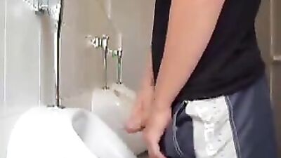 Urinal Excitement: Boy Cums Solo!