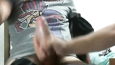 Friend giving handjob under table