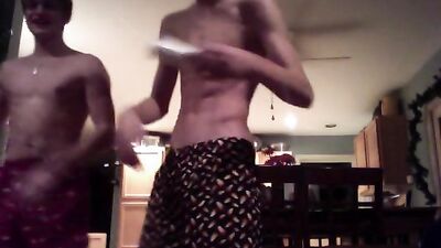 Two Shirtless Teens Compare Bodies