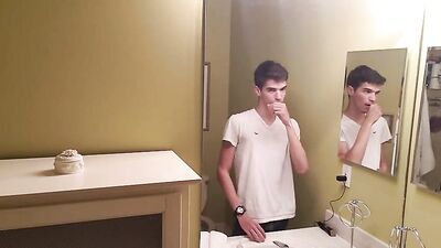 Flexing in the Bathroom and Bedroom: Cumming in Gay Porn Video