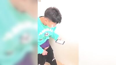 Chinese Boy Exposed in Public Toilet: Outdoor Ejaculation!