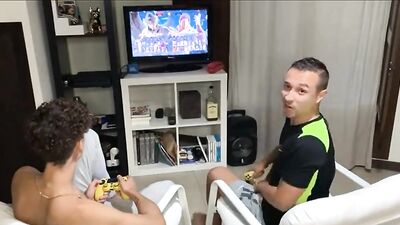 Big Cocks Interrupted by Visitor - Gay Porn Video with Horny Gamers and Twink Boys!