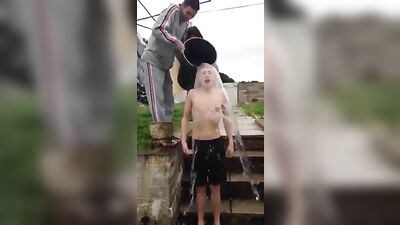 Wet & Wild: Bucket Challenge Gone Awry - Boy Stripped Bare in Public!