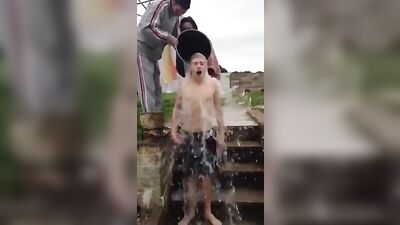 Wet & Wild: Bucket Challenge Gone Awry - Boy Stripped Bare in Public!