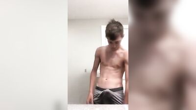 Cute Fit Brunette Strips Down and Exposes His Huge Dong on His Bathroom!