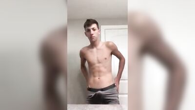 Cute Fit Brunette Strips Down and Exposes His Huge Dong on His Bathroom!