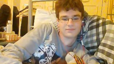 Horny glasses boy porn masturbates and cums