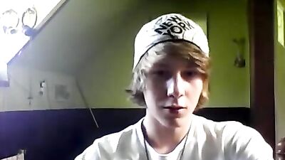 Blond boy jerks off and cums in hot gay porn scene!