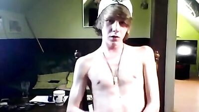 Blond boy jerks off and cums in hot gay porn scene!