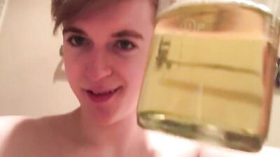 Golden Amateur Fetish Twink Pisses in Bottle - What Will He Do With It?