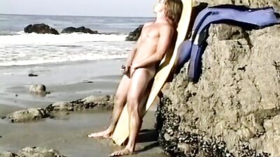 Hot surfer boys porn strips on the beach an jacks off