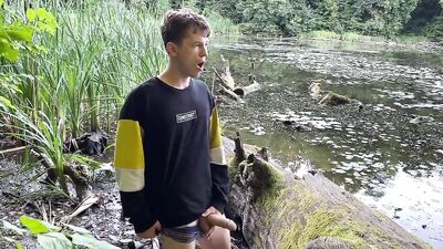 Jerking off in public park pond! - A hot and naughty twink in action!