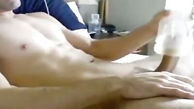 Latino boys porn pulls his thick uncut cock with his toy