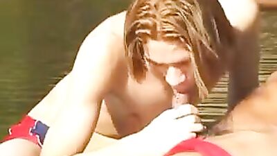 Gay Porn Videos: Dark-Skinned Buddy Fucks Skinny Twink by the River!