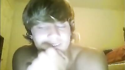 Dude jacks off for a girl with friend in room watching BOYS PORN