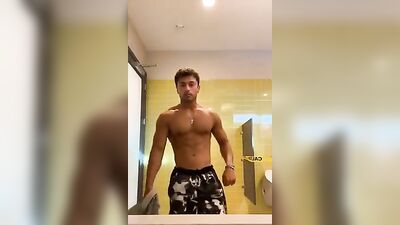 Muscle Dude Strips in Public Bath and Jerks Off - The Ultimate Gay Porn Video for Your Fantasies