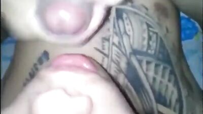 Tattooed lad sucks and swallows