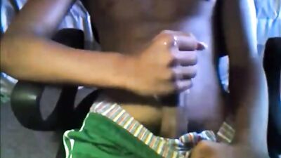 Hung black boy in green shorts with massive cumshot: A wild solo web-cam experience!