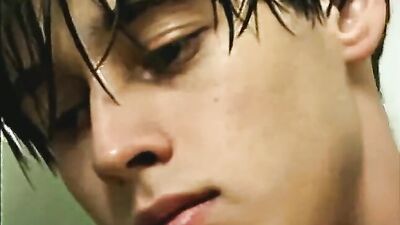 Hot and sexy boy with unbelievable body jerks to girlie magazine.