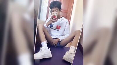 Young Asian Solo Show in Front of Mirror