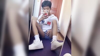 Young Asian Solo Show in Front of Mirror