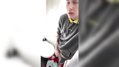 Young stud goes for a quick wank in the bathroom!