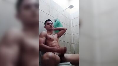Latino Muscle Boy Gets Off In The Toilet