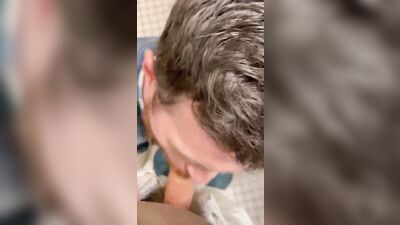 Young Twink Gets Oral Delight in the Public Toilet!
