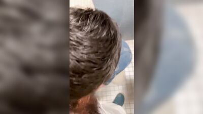 Young Twink Gets Oral Delight in the Public Toilet!