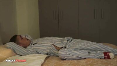 Cum-stained faces as naughty twink gets spanked in bareback action