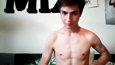Amateur Fitness Model Exudes Charm as He Masturbates on a Comfy Bed