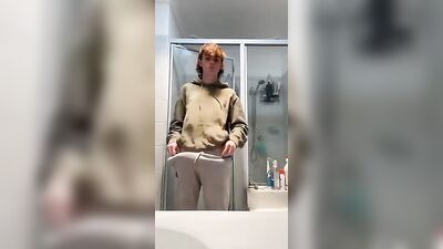 Cumming with a Huge Ginger Dick, an Amateur Fitness Model Shows Off His Uncut Cutie