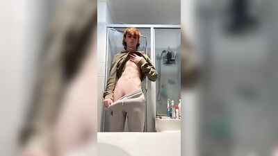 Cumming with a Huge Ginger Dick, an Amateur Fitness Model Shows Off His Uncut Cutie