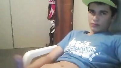 Young Stud Jerks Off and Cums on His Feet in a Tube Sock