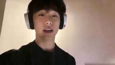 Asian Boy with Headphones Nipple Play