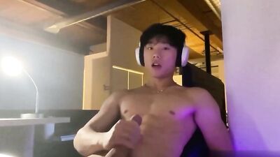 Asian Boy with Headphones Nipple Play
