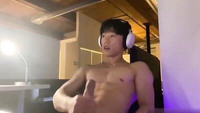 Asian Boy with Headphones Nipple Play
