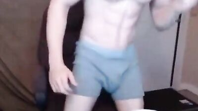 Younger Jake Orion jerks his huge cock and cums on cam