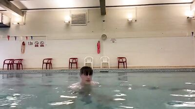 Cute fitness enthusiast pleasures himself at the community pool