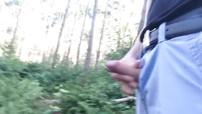 boy pissing and playing with his dick in public