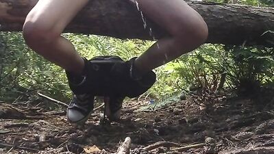 Boy pissing in front of the camera in public