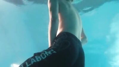 Gigantic Dicks: Pool Side Handjob by a Hunky Swimmer