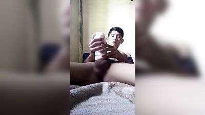 Thai jacks off to a pulsing climax