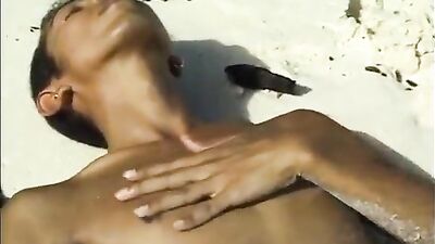 Amateur Asian guy cums on the beach in a fraternity web-cam handjob video