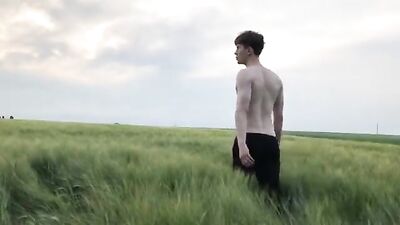 Dnz handsome twink in the park, amusing himself with a web-cam solo show and getting down to business with his own hand