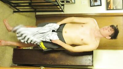 Young 23-Year-Old Spencer Takes Off His Clothes in an Intimate Amateur Solo Stripping Session in the Bedroom