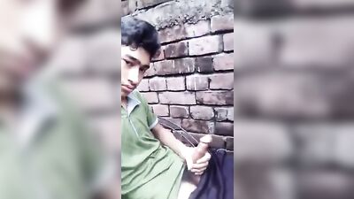 Jerking off in public while admiring big cocks with his Latino hands